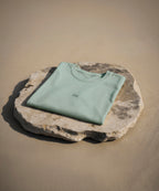 camiseta de algodon organico modelo elemento aire color verde whattii portada