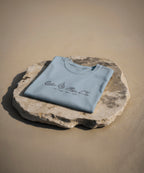 camiseta de algodon organico modelo energia agua color azul whattii portada